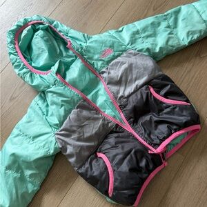 The North Face brown jacket with pink trim and mint green accents